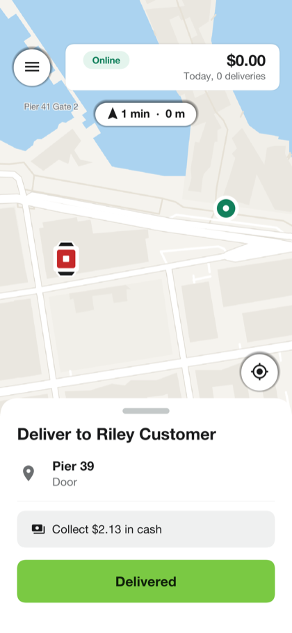 The courier screen on the second leg, with the route to the door and a button reading Delivered